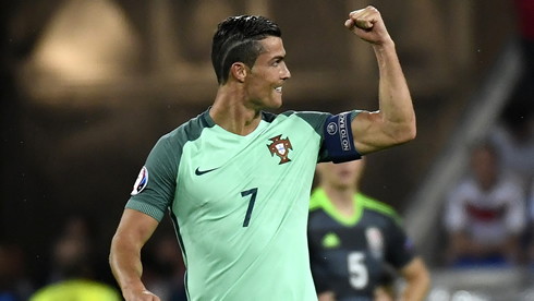 Cristiano Ronaldo showing his biceps after Portugal beat Wales 2-0 in the EURO 2016