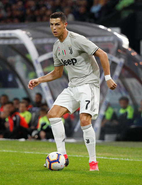 Cristiano Ronaldo wearing Juventus grey uniform in the Serie A in 2018
