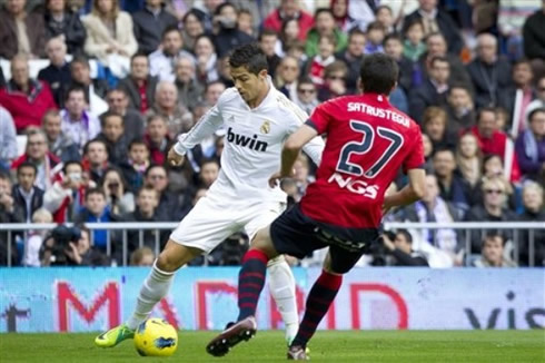 Cristiano Ronaldo attempting to trick an Osasuna defender