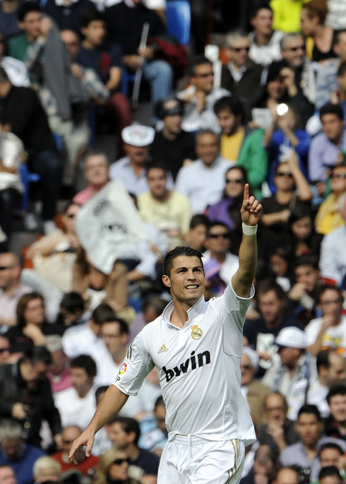 Cristiano Ronaldo points to the sky at the Santiago Bernabéu