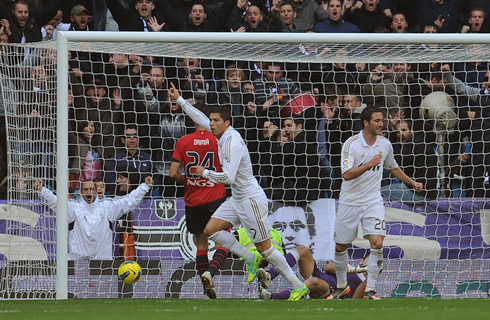 Cristiano Ronaldo preparing to run for celebrating a goal for Real Madrid