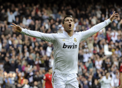 Cristiano Ronaldo opens his mouth and arms to celebrate another Real Madrid goal