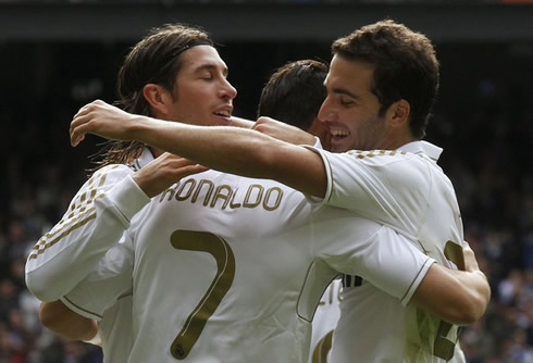 Cristiano Ronaldo hugs Sergio Ramos and Gonzalo Higuaín