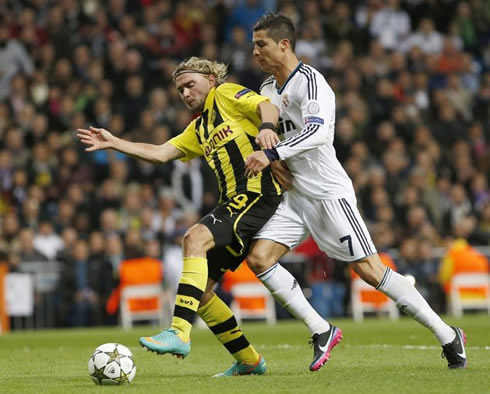 Cristiano Ronaldo trying to get around Schmelzer in Real Madrid vs Borussia Dortmund, for the UEFA Champions League 2012-2013