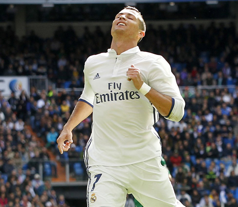 Cristiano Ronaldo smiling as he stops his run