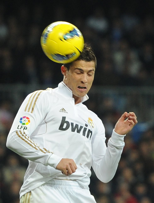 Cristiano Ronaldo heading the ball in a Real Madrid game