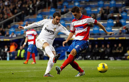 Gonzalo Higuaín striking for Real Madrid in 2011-2012
