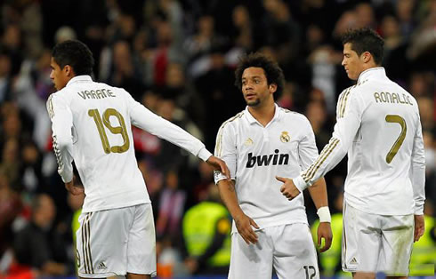 Varane and Marcelo trying to know what's going on with Cristiano Ronaldo since he looks upset with something