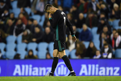 Cristiano Ronaldo puts his head down as he walks away from goal