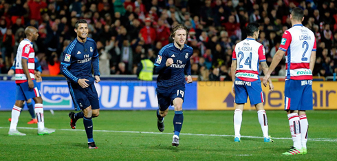 Luka Modric celebrating Real Madrid winning goal with Ronaldo on the back
