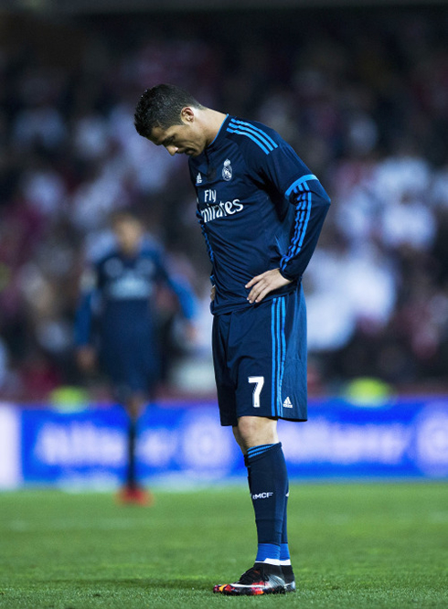 Cristiano Ronaldo looks down in disappointment
