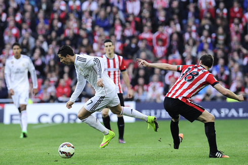 Cristiano Ronaldo gets taken down after dribbling a defender, in Athletic vs Real Madrid