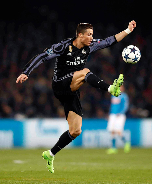 Cristiano Ronaldo controls the ball with his right foot