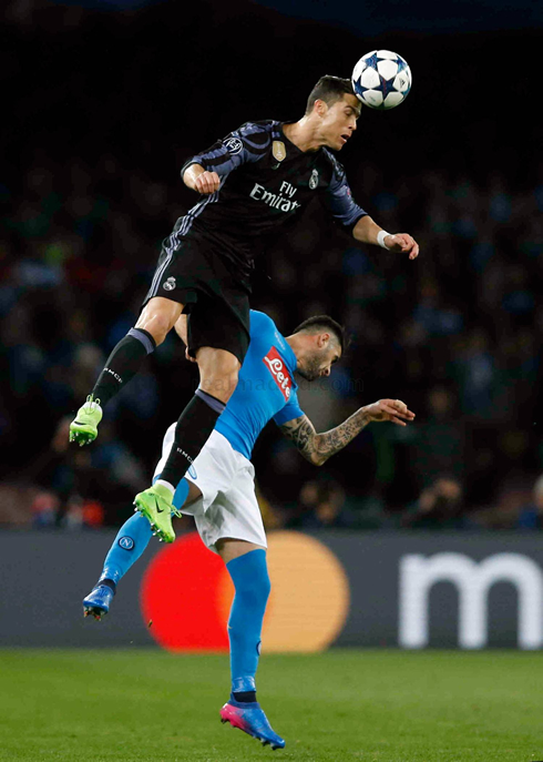 Cristiano Ronaldo rising high in the air to head the ball