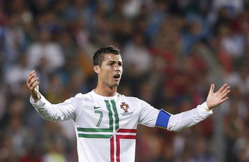 Cristiano Ronaldo opens his arms and asks for explanations at the referee, in Luxembourg 1-2 Portugal, for the 2014 FIFA World Cup qualifiers