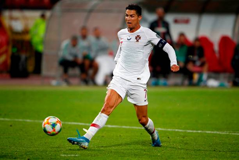 Cristiano Ronaldo scoring a goal for Portugal against Serbia