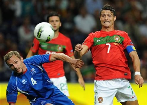 Cristiano Ronaldo gets anxious about the outcome of the play, as he looks at the ball near him