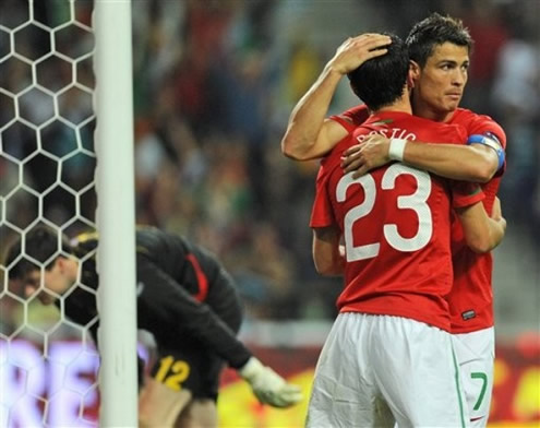 Cristiano Ronaldo hugs Hélder Postiga as they celebrate Portugal goal