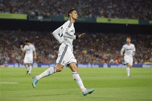 Cristiano Ronaldo running around the Camp Nou and making a gesture towards Barcelona fans for them to be calm, in La Liga 2012-2013