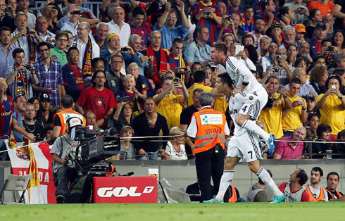 Cristiano Ronaldo holding Sergio Ramos on his back at the Camp Nou, after scoring a goal in Barcelona vs Real Madrid, for the Spanish League 2012-2013