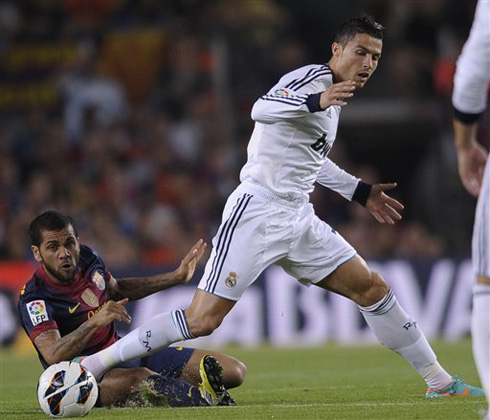 Cristiano Ronaldo getting past Daniel Alves in Barcelona vs Real Madrid, for the Spanish League 2012-2013