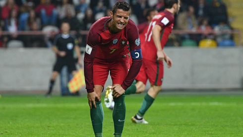 Cristiano Ronaldo in visible pain, in a match for Portugal
