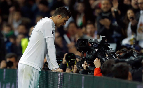 Cristiano Ronaldo looking straight to the cameras as he recovers his breath