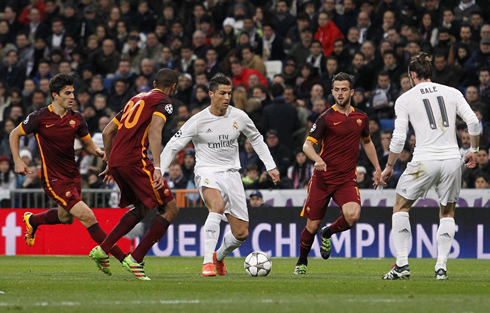 Cristiano Ronaldo in the middle of several Roma players, in a Champions League clash in 2016