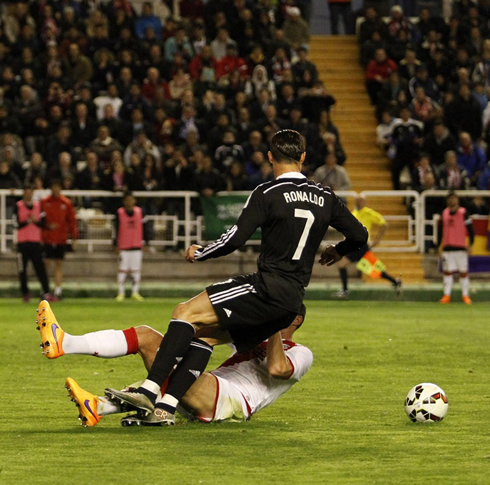 Cristiano Ronaldo being fouled inside Rayo Vallecano's box