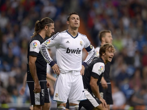Cristiano Ronaldo with his hands on his waist, in Real Madrid 6-2 Malaga, for La Liga 2013