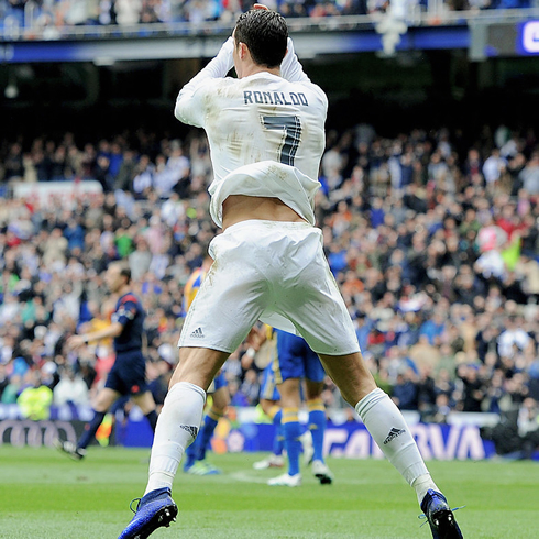 Cristiano Ronaldo jump after scoring a goal for Real Madrid