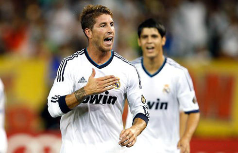 Sergio Ramos hitting his own chest as he celebrates a Real Madrid goal, with Alvaro Morata coming near him from behind, in 2012-2013