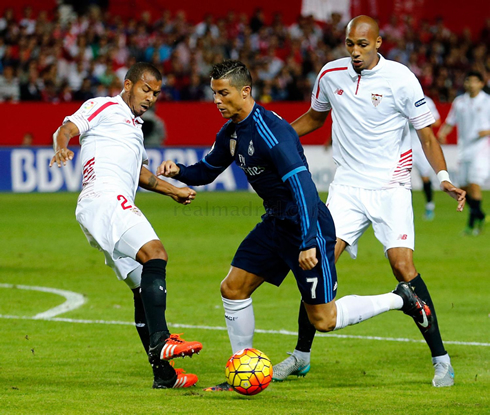 Cristiano Ronaldo trying to dribble a Sevilla defender inside the box