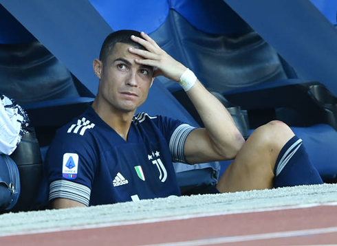 Cristiano Ronaldo looking worried after suffering a knock in a Serie A game