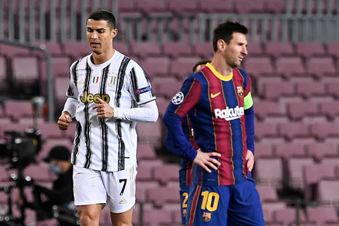 Cristiano Ronaldo running behind Lionel Messi, in Barcelona vs Juventus