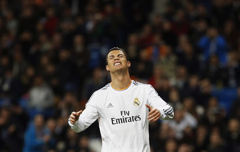 Cristiano Ronaldo grinds his teeth and closes his eyes after missing a good chance to score for Real Madrid