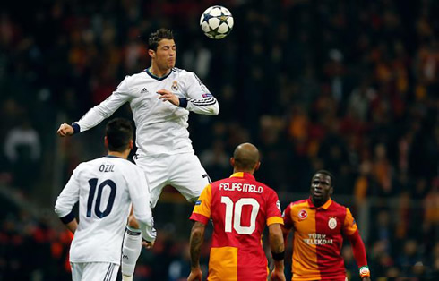 Cristiano Ronaldo rising in the air above everyone else, to head a ball during the match between Real Madrid and Galatasaray, in 2013