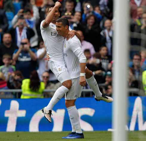 Cristiano Ronaldo holding Casemiro around his waist, in Real Madrid goal celebrations
