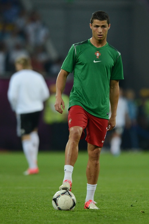 Cristiano Ronaldo in a green jersey, warming up for the match between Portugal and Germany for the EURO 2012