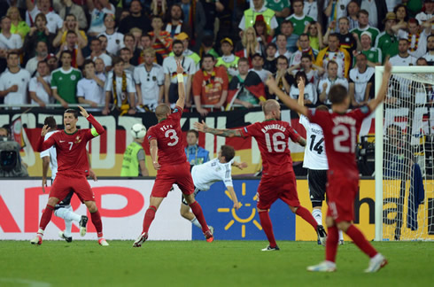 Cristiano Ronaldo, Pepe, Raúl Meireles and João Pereira, waving at the referees and claiming for goal in Portugal vs Germany, for the EURO 2012