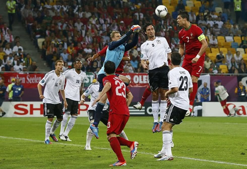 Cristiano Ronaldo raising more than anyone else in a corner in the match between Portugal and Germany, EURO 2012