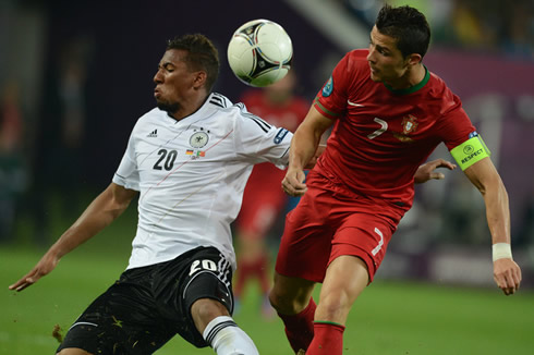 Cristiano Ronaldo sending Boateng to the ground when charging at him from behind, in the EURO 2012