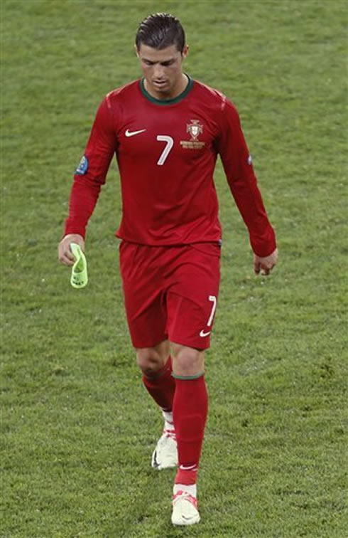 Cristiano Ronaldo walking out the pitch after Portugal lost to Germany in the EURO 2012