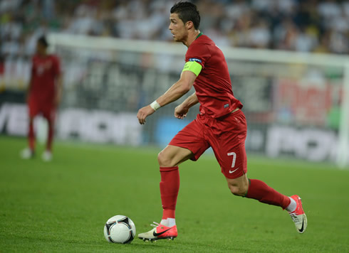 Cristiano Ronaldo running with the ball during the game between Portugal and Germany for the EURO 2012