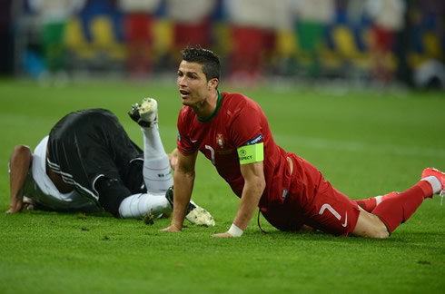 José Mourinho raising from the floor as if he was doing a push-up, in Portugal vs Germany for the EURO 2012