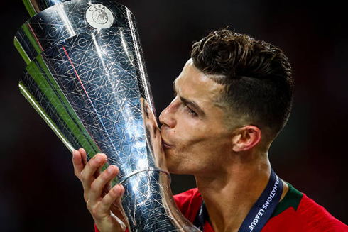 Cristiano Ronaldo kissing the UEFA Nations League trophy