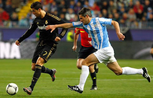 Cristiano Ronaldo running away from Toulalan