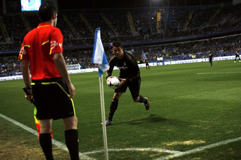 Cristiano Ronaldo rushing to take a corner kick against Malaga in the Copa del Rey 2011-2012