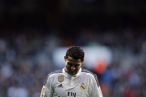 Cristiano Ronaldo grinds his teeth as he puts his head down