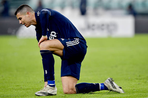 Cristiano Ronaldo getting up from the ground